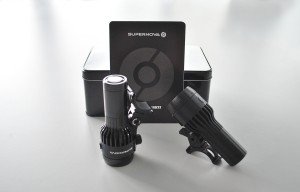 Supernova bike light, final product on the left and MakerBot 3D printed prototype on the right