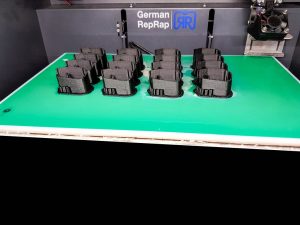 Figure 2: The German RepRap X350 simultaneously printing 16 parts for series production